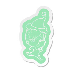 cartoon  sticker of a surprised girl wearing santa hat