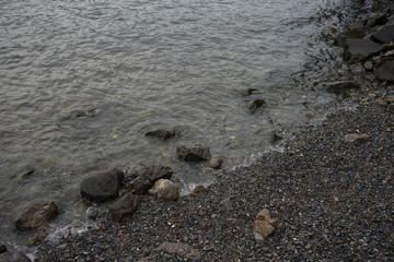 Fototapeta na wymiar Italy, Varenna, Lake Como, a sandy beach