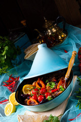 Tasty spicy beef with various vegetables cooked in tagine