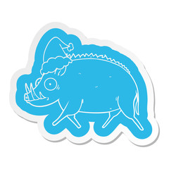 cartoon  sticker of a wild boar wearing santa hat