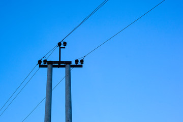 pole with electric lines of wires under voltage