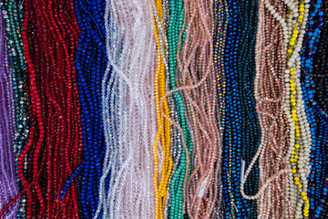 Display of beads necklaces.