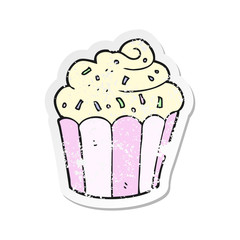 retro distressed sticker of a cartoon cupcake