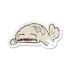 distressed sticker of a cartoon sad old fish
