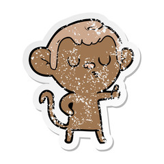 distressed sticker of a cartoon calm monkey