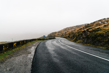 Misty Lonely Road in Ireland