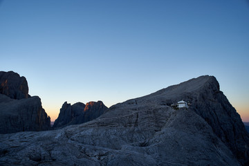 Rosetta peak with moon at sunrise, Pale di San Martino, Primiero, Italy