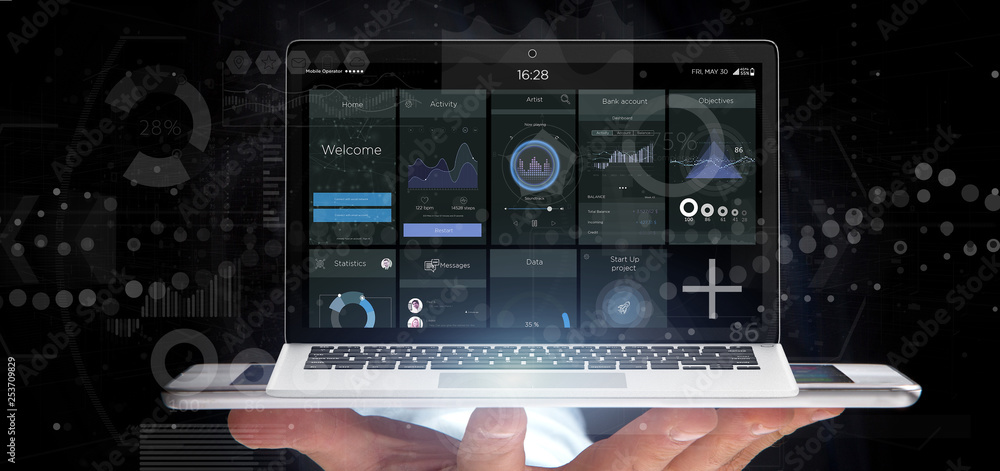 Poster businessman holding laptop with business user interface data on the screen isolated on a background