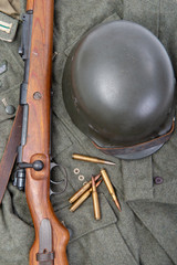 vintage background with german army field equipment and rifle