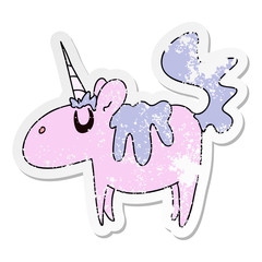 distressed sticker of a quirky hand drawn cartoon unicorn