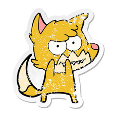 distressed sticker of a cartoon grinning fox
