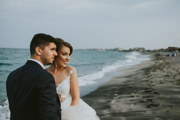 young wedding couple on the beach