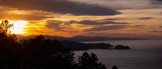 Sunset on the coast of Gipuzkoa with Getaria in the background, Basque Country