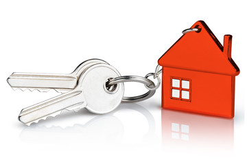 House keys with red house shaped keychain, isolated on white background