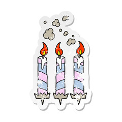 retro distressed sticker of a cartoon birthday cake candles