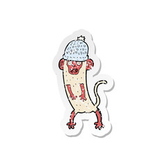 retro distressed sticker of a cartoon crazy monkey