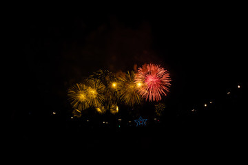 Colorful fireworks on the black sky background