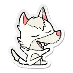 distressed sticker of a cartoon wolf laughing