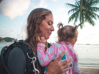 Working mum, super mum. PADI Scuba  Diving Woman with equipment  in the poolside
