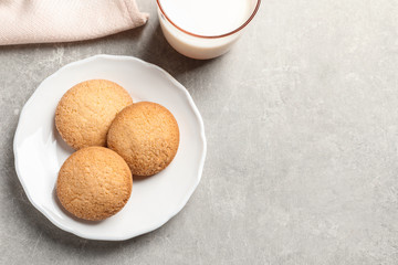 Plate with Danish butter cookies on table, top view. Space for text