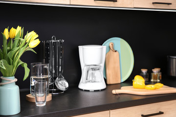 Stylish kitchen counter with set of houseware