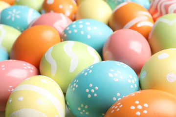 Fototapeta na wymiar Many beautiful painted Easter eggs as background, closeup