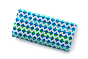 Bright towel on white background. Beach accessories