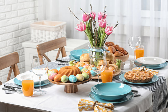 Festive Easter Table Setting With Traditional Meal At Home