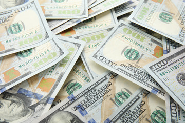 Fototapeta na wymiar Many dollar banknotes as background. American national currency