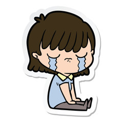 sticker of a cartoon woman crying