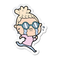 sticker of a cartoon crying woman wearing spectacles