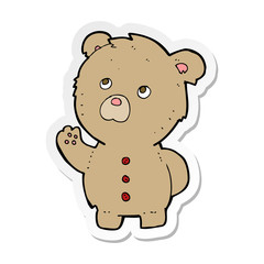 sticker of a cartoon waving teddy bear