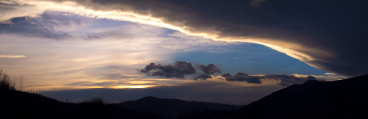 Amazing sky. Scenic Sunset in the mountains