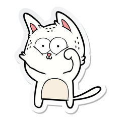 sticker of a cartoon cat being cute