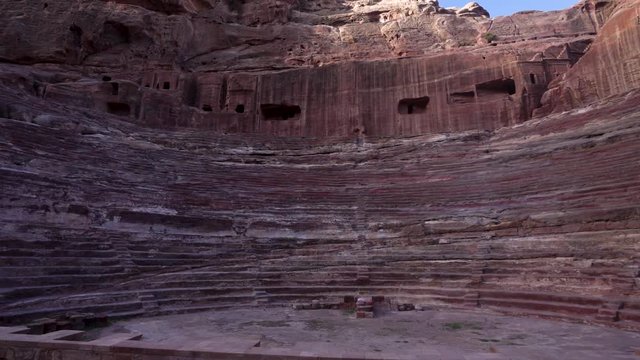 Rotating Shot of Ancient Petra Theater With Visible Auditorium Which Consists of Three Horizontal Sections of Seats Separated by Passageways and Seven Stairways to Ascend in Ancient City of Petra