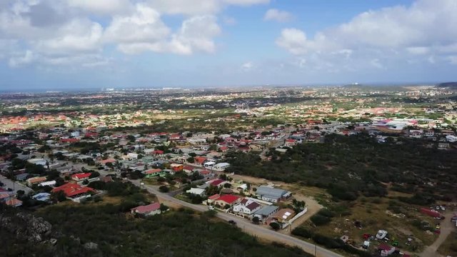 Residential neighborhoods at the bottom of Hooiberg mountain on the island of Aruba.