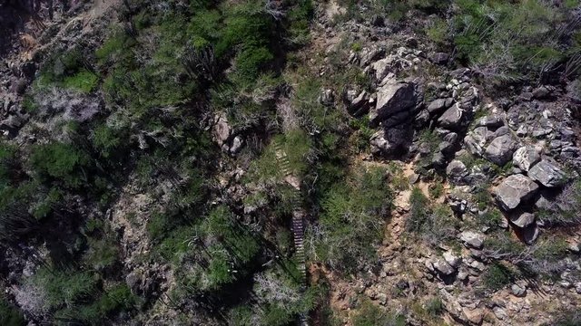 Aerial shot of the massive staircase going up the side of Hooiberg mountain in Aruba.