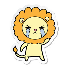 sticker of a cartoon crying lion