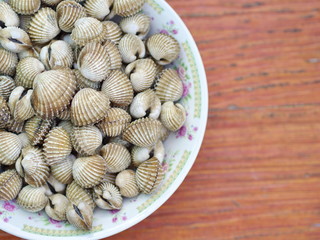 Closeup Parboiled cockles or steamed blanched clams - Northeast Thai Food 