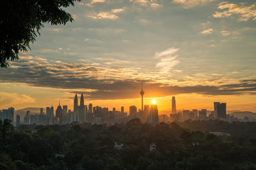 Fototapeta na wymiar Majestic view of Kuala Lumpur cityscape during sunrise.