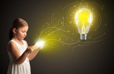 Adorable girl working on tablet with new idea concept
