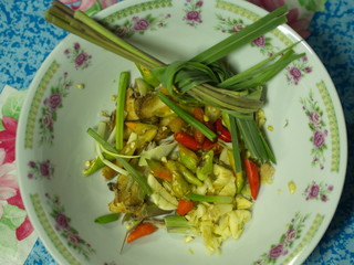 Shell Soup with Garlic, Chilli , Mint and Basil. Traditional Northeast of Thailand food -  Esan Food  name Pad Hoy with Horapa.