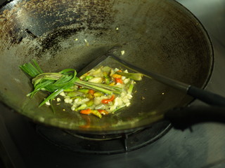 Shell Soup with Garlic, Chilli , Mint and Basil. Traditional Northeast of Thailand food -  Esan Food  name Pad Hoy with Horapa.