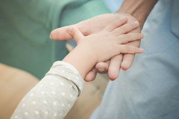The girls were holding hands grandfather was sick, discouraged.