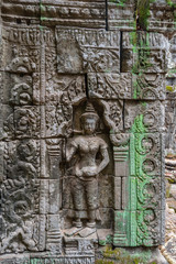 Relief of guard on the wall of Ta Prohm temple, Cambodia