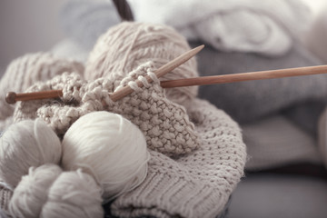 Fototapeta na wymiar The macro concept of knitting wool and needles