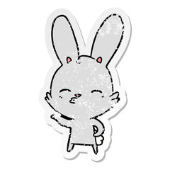 Fototapeta na wymiar distressed sticker of a curious bunny cartoon