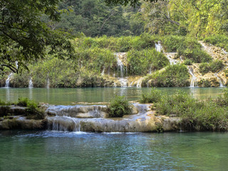 Fototapeta na wymiar the Cahabon River, forms numerous cascades, Semuc champey, Guatemala.