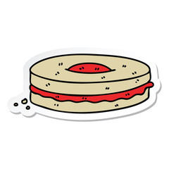 sticker of a quirky hand drawn cartoon jam biscuit