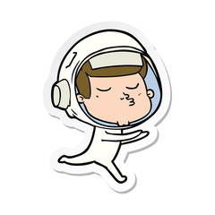 sticker of a cartoon confident astronaut